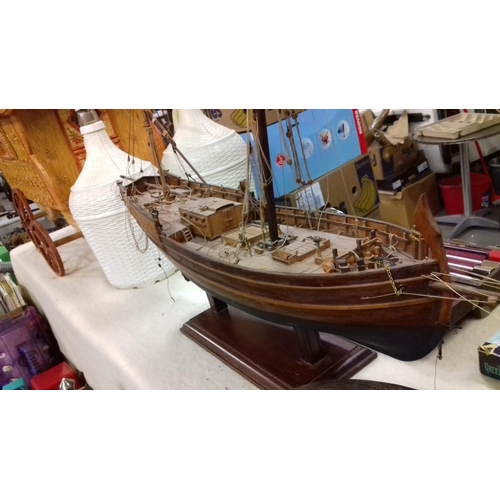 245 - Wooden model sailing ship on stand, needs minor attention