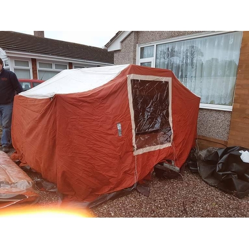 309A - 4 x 4ft conway? trailer tent with spare wheel and awning. usual wear but guaranteed watertight