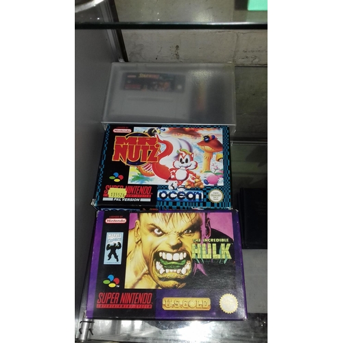 20 - Boxed super nintendo games being mr nutz, shaq fu, the incredible hulk, street fighter 2 games plus ... 