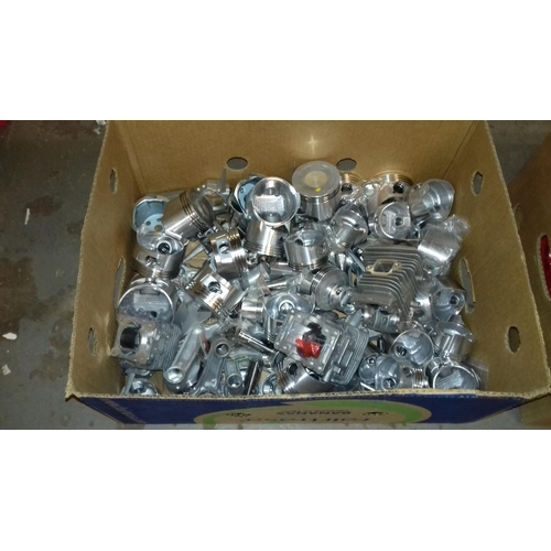 282 - 2 x boxes of new honda cx lawnmower parts being pistons, pull chords etc