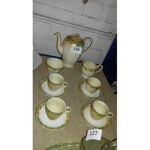 128 - Vintage Grindley England tea service, hairline crack on milk jug, with four x cups and saucers, smal... 