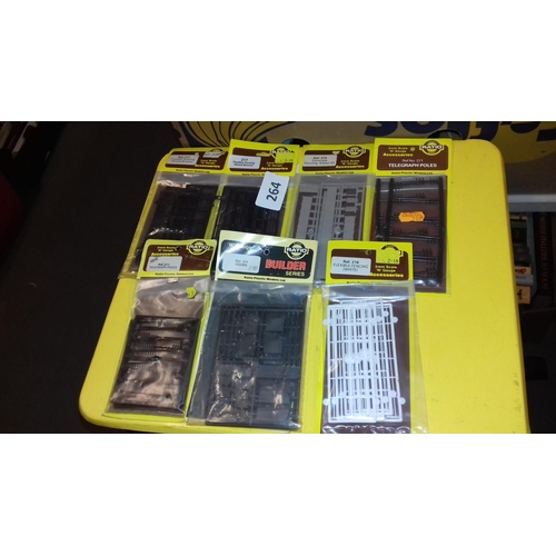 264 - Bundle of new and still carded ratio plastic models N Gauge accessories