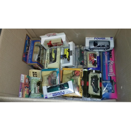 391 - 2 x boxes of assorted new and boxed or carded model cars and vans etc.