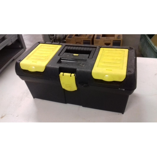 215 - Small Stanley hard plastic tool box and contents