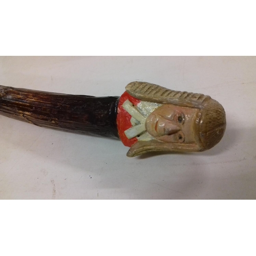 5 - Bamboo look walking cane (106 cm long) with carved look judicial figure head topper