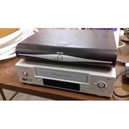 239 - Sky hd+ digital set top box and vcr, both no remotes