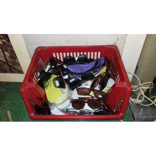 243 - Crate of new buntings, new sunglasses and new flip flops