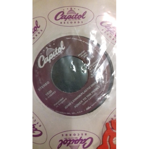 14 - 2 x Capitol records purple label vinyl singles being john lennon # 9 dream/what you got & power to t... 