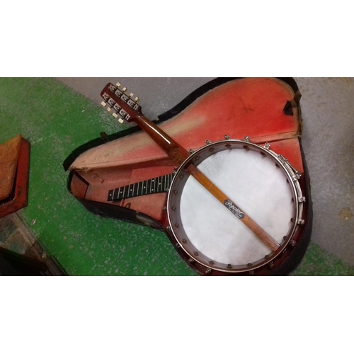 108 - The windsor popular 8 string banjolele in need of tlc in case with spare strings