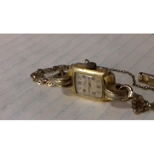 24 - Avia 15 jewel ladies watch, non working, with ornate unstamped yellow metal bracelet strap