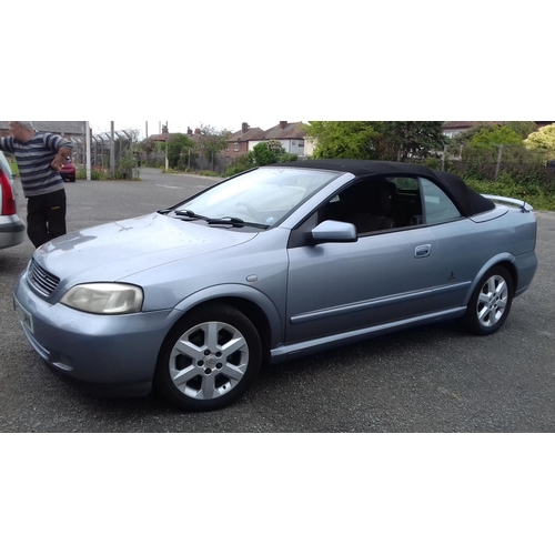 145 - 2003 registered vauxhall astra coupe convertible 1.8 petrol. Clean and tidy with no roof leaks and m... 