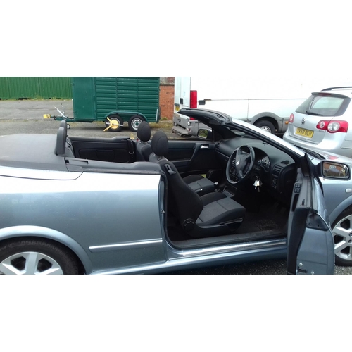 145 - 2003 registered vauxhall astra coupe convertible 1.8 petrol. Clean and tidy with no roof leaks and m... 