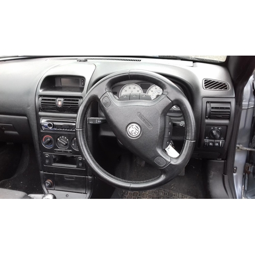 145 - 2003 registered vauxhall astra coupe convertible 1.8 petrol. Clean and tidy with no roof leaks and m... 