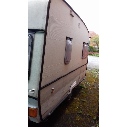 235 - Knowsley eros 3 berth 4 touring caravan in good general condition with no leaks. comes with awning