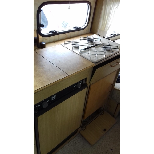 235 - Knowsley eros 3 berth 4 touring caravan in good general condition with no leaks. comes with awning