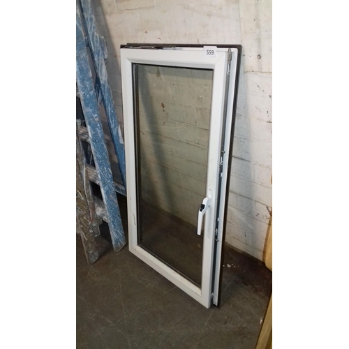 559 - UPVC double glazed window approx 95 x 55 cm