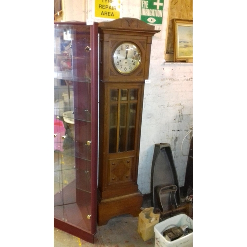 571 - Oak long case clock with key, non working since being moved