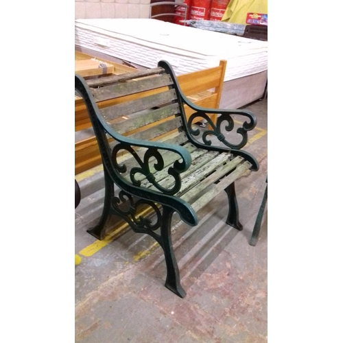 461 - Cast end weathered garden furniture set consisting of table, bench and pair of seats