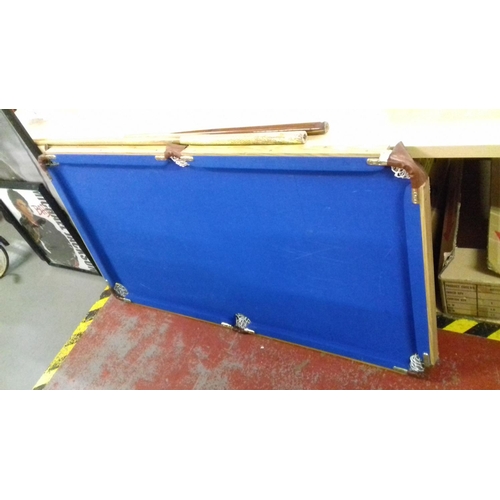 449 - Blue folding 4 ft pool table with balls, cues etc