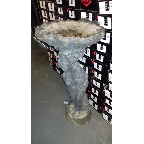 5 - Large old concrete birdbath with child and fish pedestal and shell shaped top approx 100 cm tall