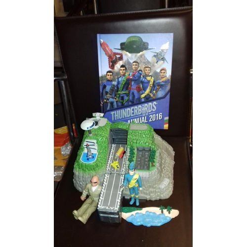 120 - Thunderbirds tracy island with figures plus thunderbirds book