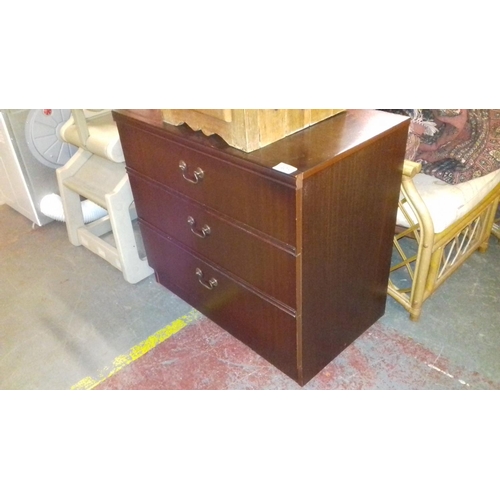 405 - Mahogany look 3 drawer chest on castors 75 x 45 x 70 cm tall