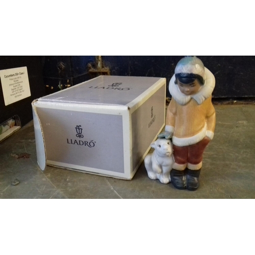 78 - Boxed 15 cm tall Lladro eskimo child with polar bear figure