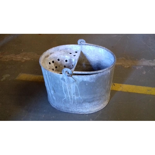 34 - Old galvanised mop bucket