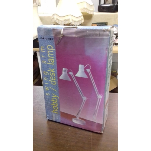 514 - Boxed and unused lloytron swing arm angle poise lamp