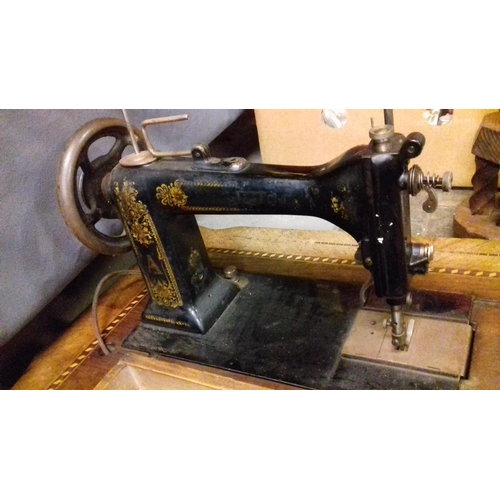 384 - Vintage perfecta treadle sewing machine on parquetry table top with drawer