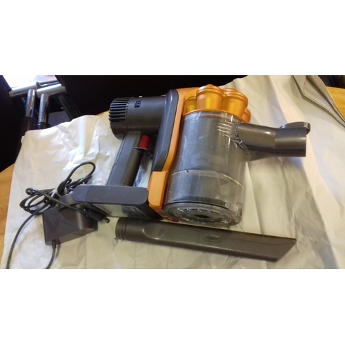 507 - Dyson dc34 rechargeable hand hed vac with charger