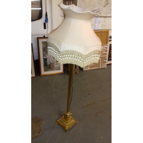 489 - Brass look pedestal standard lamp with shade