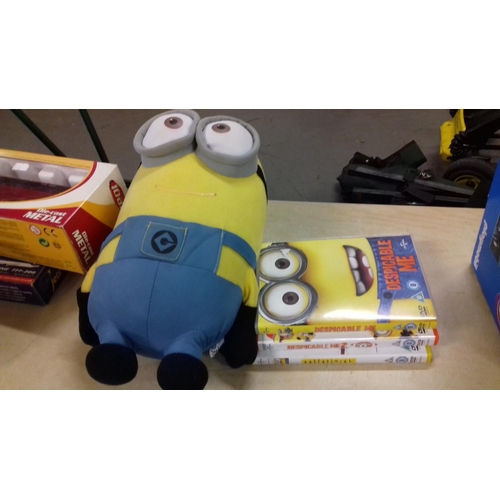 227 - Set of 3 x minions dvds and medium size minion dave soft toy