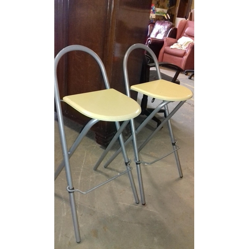 517 - Pair of silver and light wood folding breakfast bar stools