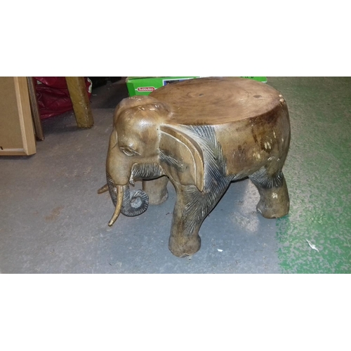 437 - 22 cm tall carved wooden elephant plant stand