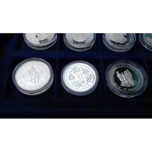 657 - Display case with 12 x assorted Westminster collection and royal mint 925 silver proof coins