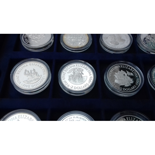 657 - Display case with 12 x assorted Westminster collection and royal mint 925 silver proof coins