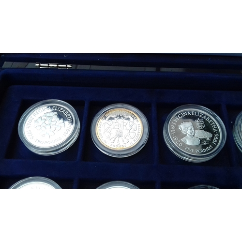 657 - Display case with 12 x assorted Westminster collection and royal mint 925 silver proof coins