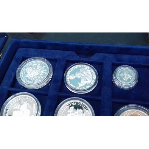 657 - Display case with 12 x assorted Westminster collection and royal mint 925 silver proof coins