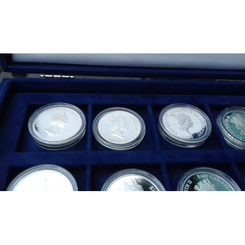 657 - Display case with 12 x assorted Westminster collection and royal mint 925 silver proof coins