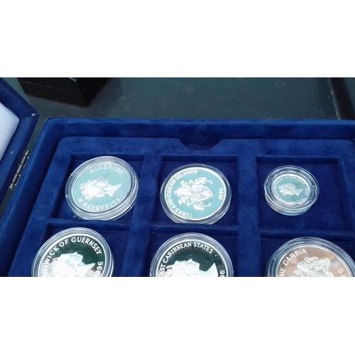 657 - Display case with 12 x assorted Westminster collection and royal mint 925 silver proof coins