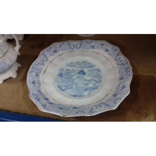 132 - 19th century blue and white (faded) tea service with bowl and plate, 4 items with repaired damage or... 