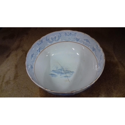 132 - 19th century blue and white (faded) tea service with bowl and plate, 4 items with repaired damage or... 