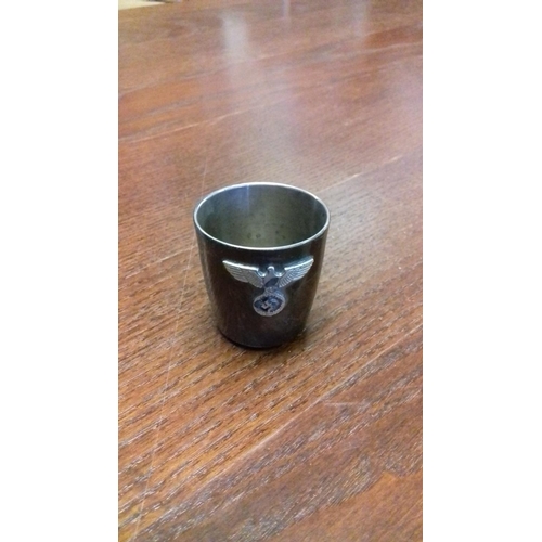 610 - Metal shot glass with WW2 german naval badge