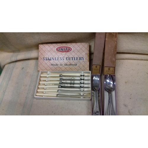 312 - Set of 6 x Unity knives and forks with 5 dessert/soup spoons all in original boxes