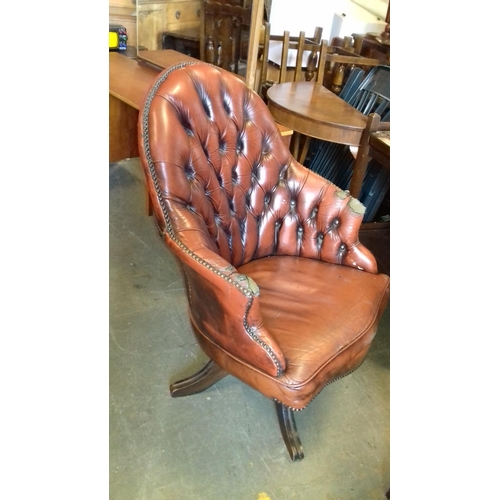 490 - Oxblood red chesterfield swivel office chair