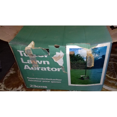 199 - used Tudor 23 cm lawn airator in original box