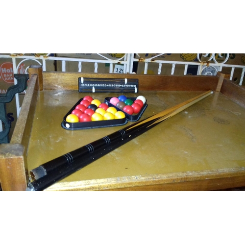 516 - 4 ft snooker table, 2 x snooker cues, triangles, pool balls and snooker balls