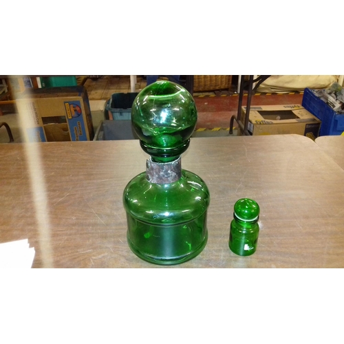 114 - 28 cm tall Belgian green glass decanter and matching miniature decanter