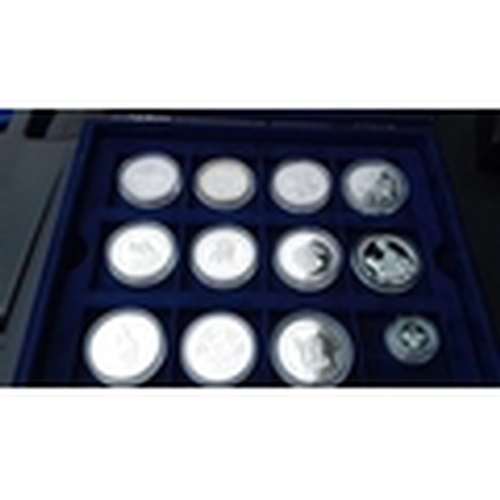 722 - Display case with 12 x assorted Westminster collection and royal mint 925 silver proof coins